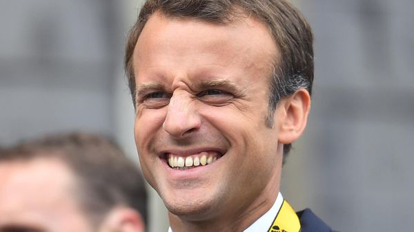 French President Emmanuel Macron grimaces on the town hall balcony on occasion of the Charlemagne Prize awarding in Aachen, Germany, Thursday, May 10, 2018 - Sputnik International