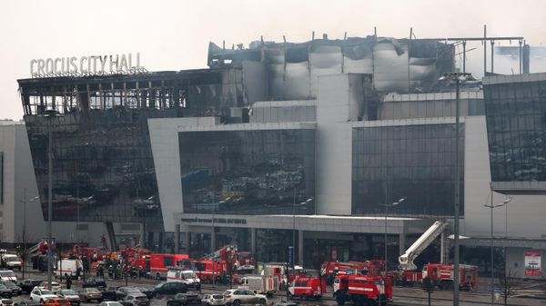 Members of emergency services work at the scene of the gun attack at the Crocus City Hall concert hall in Krasnogorsk, outside Moscow, on March 23, 2024.  - Sputnik International