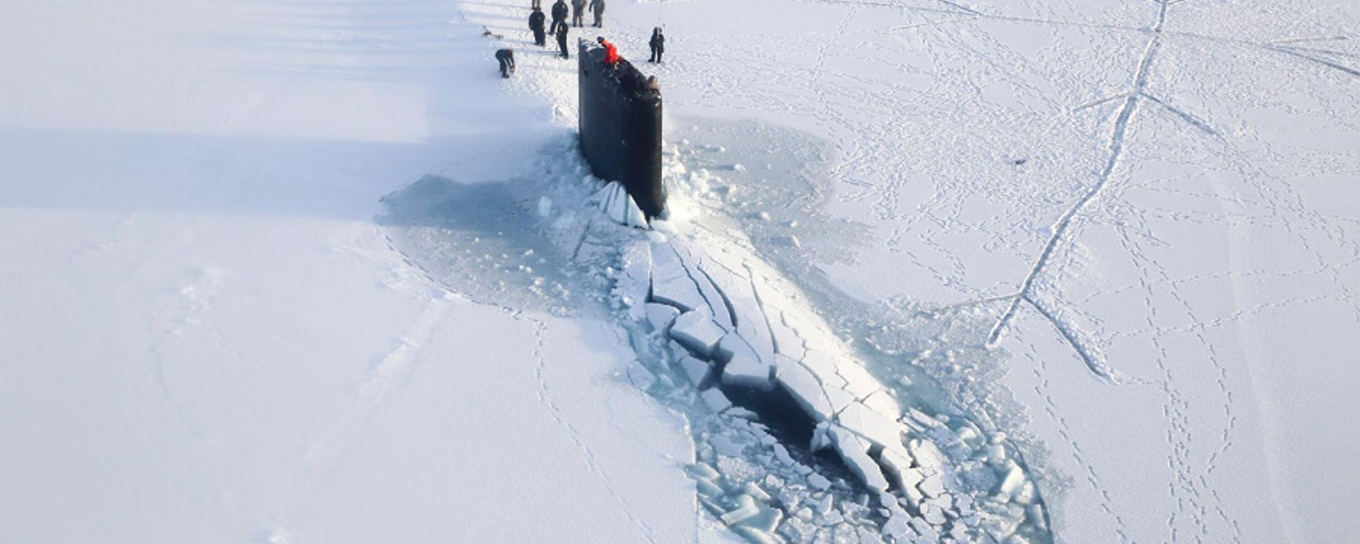 This 2016 photo provided by the U.S. Navy, shows a submarine after breaking through ice in the Beaufort Sea off Alaska's north coast.  - Sputnik International, 1920, 09.12.2025