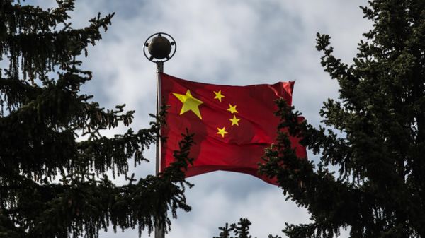 Chinese national flag at the Chinese Embassy in the Russian Federation in Moscow - Sputnik International