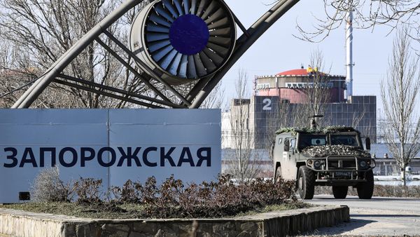 An armored vehicle leaves the territory of the Zaporozhye Nuclear Power Plant (ZNPP), accompanying the motorcade with IAEA Director General Raphael Grossi - Sputnik International