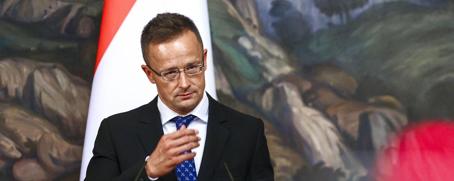 In this handout photo released by Russian Foreign Ministry Press Service, Hungary's Minister of Foreign Affairs and Trade Peter Szijjarto gestures while speaking to the media during a joint news conference with Russian Foreign Minister Sergey Lavrov following their talks in Moscow, Russia, Thursday, July 21, 2022 - Sputnik International, 1920, 23.12.2024