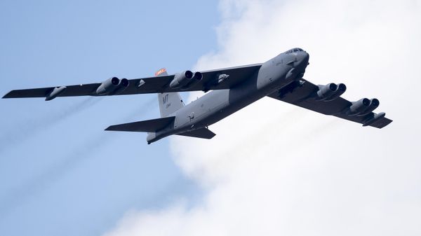 A US Air Force B-52 bomber flies over Training Range in Pabrade during a military exercise 'Iron Wolf 2016' some 60km.(38 miles) north of the capital Vilnius, Lithuania, Thursday, June 16, 2016. (AP Photo/Mindaugas Kulbis) - Sputnik International