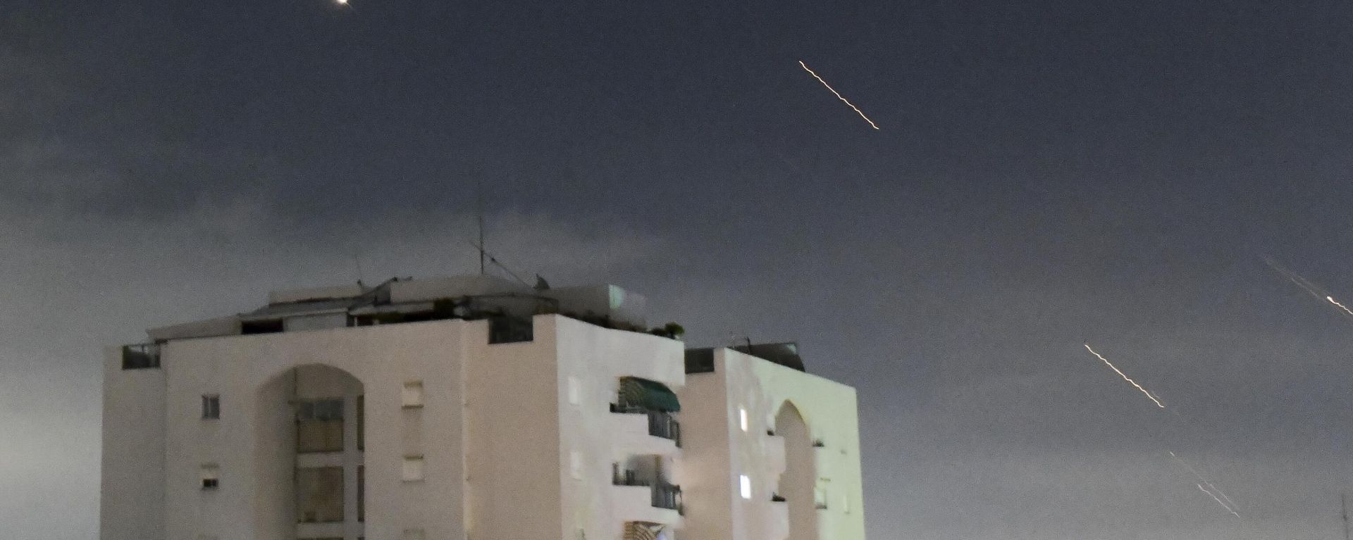 Israeli Iron Dome air defense system launches to intercept missiles fired from Iran, in central Israel, Sunday, April 14, 2024. Israeli Iron Dome air defense system launches to intercept missiles fired from Iran, in central Israel, Sunday, April 14, 2024. - Sputnik International, 1920, 14.08.2024