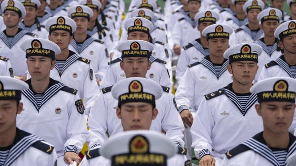 Chinese sailors sit in rows, a day before the opening of the West Pacific Naval Symposium in Qingdao in eastern China's Shandong province. Chinese sailors sit in rows, a day before the opening of the West Pacific Naval Symposium in Qingdao in eastern China's Shandong province. - Sputnik International