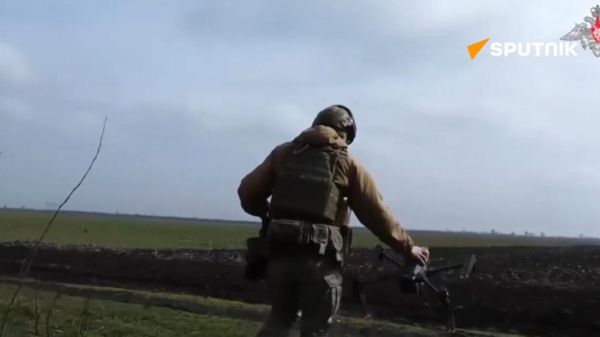 Dnepr battlegroup strike Ukrainian positions with UAVs - Sputnik International
