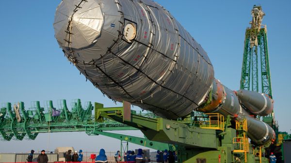 Soyuz-2.1b rocket booster with a Fregat upper stage and the first Arktika-M satellite is transported from an assembling hangar to a launchpad ahead of its upcoming launch, at the Baikonur Cosmodrome, Kazakhstan - Sputnik International