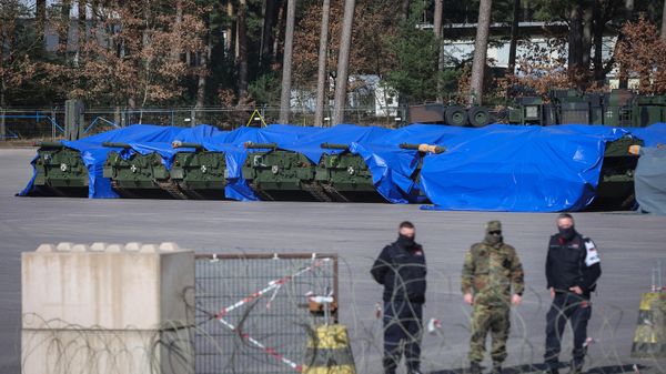 Leopard 1 A5 combat tanks ready for delivery are pictured at the military ground before a visit of Ukrainian troop by German President and German Defence Minister at the Klietz military training area in Klietz, eastern Germany, on February 23, 2024. Soldiers from Ukraine are currently being trained on the Leopard 1 A5 tank in the German Bundeswehr's troop training centre in Klietz.  - Sputnik International