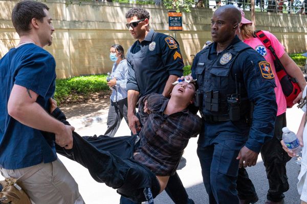 An activist under arrest at the pro-Palestinian rally at the University of Texas (April 29, 2024). - Sputnik International