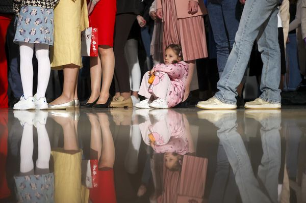 An Orthodox girl sits next to her family member during an easter service in the Orthodox Church in Sarajevo, Bosnia. - Sputnik International