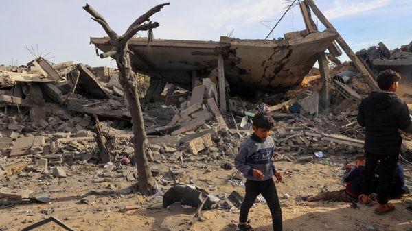 Children play in the rubble of a damaged building where two hostages were reportedly held before being rescued during an operation by Israeli security forcess in Rafah, on the southern Gaza Strip on February 12, 2024, amid ongoing battles between Israel and the militant group Hamas - Sputnik International