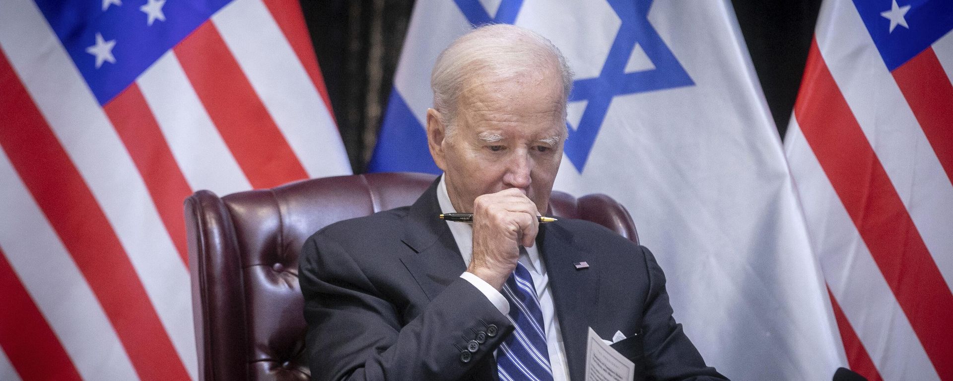 US President Joe Biden pauses during a meeting with Israeli Prime Minister Benjamin Netanyahu to discuss the war between Israel and Hamas, in Tel Aviv, Israel, Oct. 18, 2023 - Sputnik International, 1920, 14.07.2024