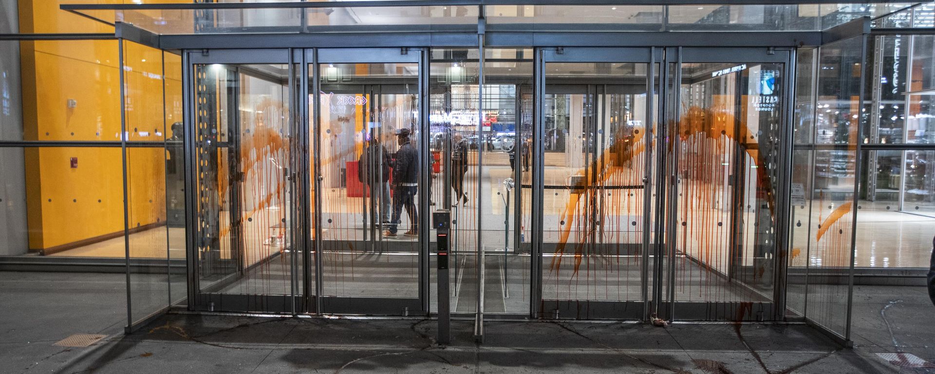 This photo shows The New York Times building entrance after being covered with red tint by Pro-Palestinian demonstrators as they march calling for a cease fire in Gaza, Friday, Nov. 10, 2023, in New York. (AP Photo/Eduardo Munoz Alvarez) - Sputnik International, 1920, 16.05.2024