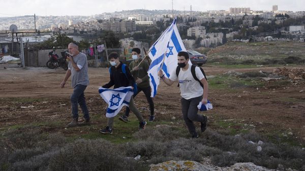 In this Nov. 16, 2020, file, photo, protesters arrive to heckle a news conference by European Union officials visiting the construction site for Givat Hamatos settlement in Jerusalem. Israel is quietly advancing controversial settlement projects in and around Jerusalem while refraining from major announcements that could anger the Biden administration. Critics say Israel is paving the way for rapid growth when the political climate changes - Sputnik International