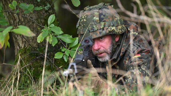 Reservists of the German Armed Forces practice protecting defense-critical infrastructure during a training exercise as part of the regional territorial commands at the Luetzow Barracks in Muenster, western Germany on October 24, 2023.  - Sputnik International