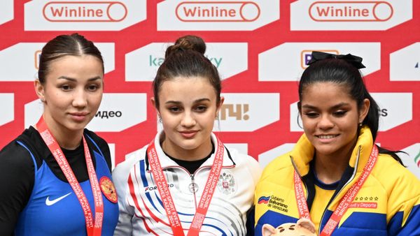 Silver medallist Polina Andreeva of Russia, gold medallist Elizaveta Zhatkina of Russia and bronze medallist Victoria Nazareth Tovar Milano of Venezuela - Sputnik International