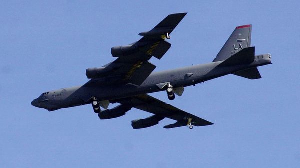 A U.S. B-52 Stratofortress bomber flies over East Hagatna in Guam on Monday afternoon, March 10, 2003.  - Sputnik International