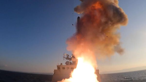In this handout video grab released by the Russian Defense Ministry, a Russian naval  ship launches missiles during a high-precision attack on Ukrainian military facilities during Russia's military operation in Ukraine, at an unknown location.  - Sputnik International
