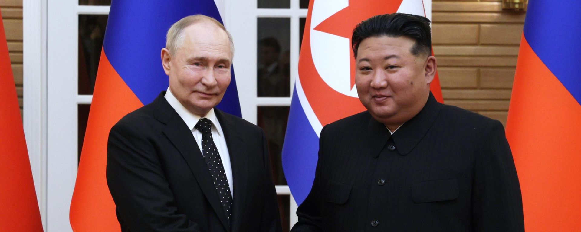 Russian President Vladimir Putin and North Korean leader Kim Jong Un pose for photos after a welcoming ceremony at Kumsusan state residence in Pyongyang, North Korea - Sputnik International, 1920, 07.09.2026