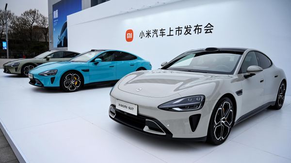 Chinese electronics company Xiaomi's first electric vehicles 'Xiaomi SU7 model' are seen on display at a launch event in Beijing on March 28, 2024 - Sputnik International