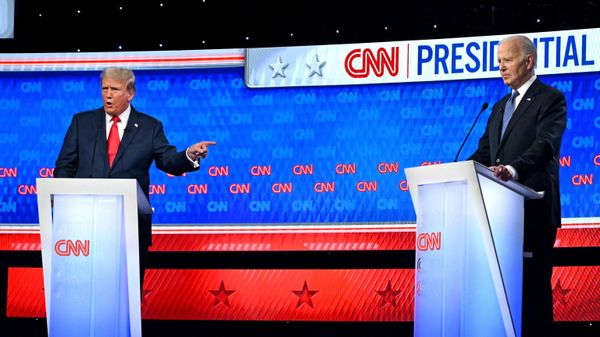 US President Joe Biden and former US President and Republican presidential candidate Donald Trump participate in the first presidential debate of the 2024 elections at CNN's studios in Atlanta, Georgia, on June 27, 2024. - Sputnik International