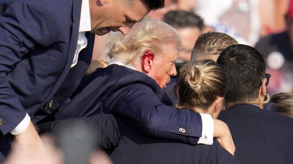 Republican presidential candidate former President Donald Trump is helped off the stage at a campaign event in Butler, Pa., on Saturday, July 13, 2024.  - Sputnik International