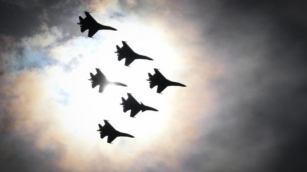 Sukhoi Su-30SM and Su-35S fighter jets of the Russkie Vityazi (Russian Knights) aerobatic team perform during the Fleet-2024 International Maritime Defence Show in Kronstadt, a seaport on the outskirts of St Petersburg, Russia. - Sputnik International