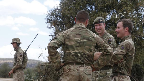 Britain's Prince William, 2nd right, speaks to soldiers during a visit to the 1st Battalion the Irish Guards battle group, training under the British Army Training Unit Kenya (BATUK), in his role as Colonel of the Regiment, in Laikipia, Kenya Sunday, Sept. 30, 2018 - Sputnik International