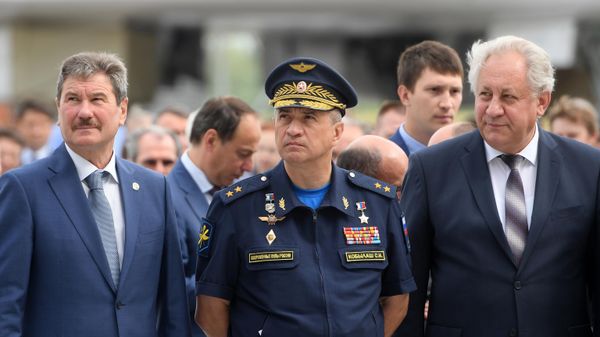 Then-Russian Aerospace Forces' Long-range Aviation Commander Sergei Kobylash (center) at the roll-out ceremony preceding land and flight tests of Tu-22M3M modernized bomber at Gorbunov Kazan Aviation Factory. - Sputnik International