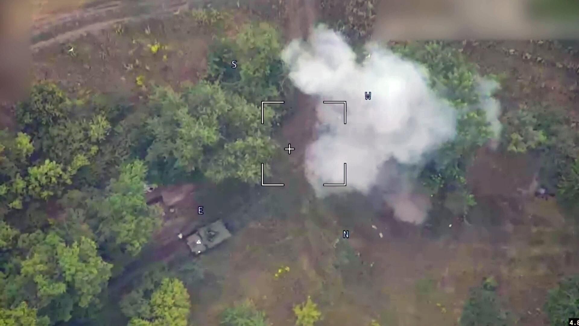 In this handout video grab released by the Russian Defence Ministry, a view shows a strike of a Russian Lancet kamikaze drone on a US-made Bradley infantry fighting vehicle used by Ukrainian troops in the border area of the Russia's Kursk Region.  - Sputnik International, 1920, 08.08.2024
