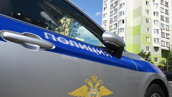 A police car is seen at the site of a car blast that wounded Russian military official Andrei Torgashov and his wife in Moscow, Russia. - Sputnik International