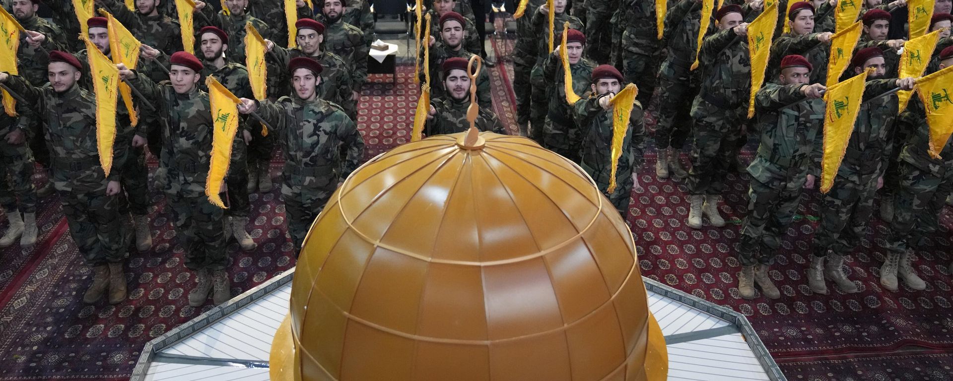 Hezbollah fighters parade in front of a replica of the Dome of the Rock Mosque during a rally to mark Jerusalem day, in a southern suburb of Beirut, Lebanon, Friday, April 14, 2023. File photo. Hezbollah fighters parade in front of a replica of the Dome of the Rock Mosque during a rally to mark Jerusalem day, in a southern suburb of Beirut, Lebanon, Friday, April 14, 2023. File photo. - Sputnik International, 1920, 11.09.2025