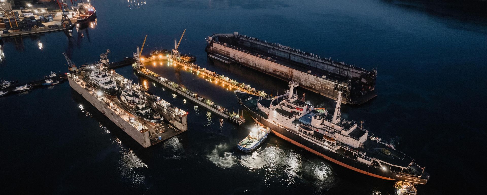 Towing of the nuclear icebreaker Lenin from its mooring place at the Murmansk Marine Station to the PD-3 dock located in the port waters for scheduled repairs. The legendary nuclear icebreaker will be prepared for the anniversary of the nuclear icebreaker fleet, with its hull and wheelhouse painted. In addition, the hull tanks and bottom-side fittings will be inspected. August 13, 2024. Towing of the nuclear icebreaker Lenin from its mooring place at the Murmansk Marine Station to the PD-3 dock located in the port waters for scheduled repairs. The legendary nuclear icebreaker will be prepared for the anniversary of the nuclear icebreaker fleet, with its hull and wheelhouse painted. In addition, the hull tanks and bottom-side fittings will be inspected. August 13, 2024. - Sputnik International, 1920, 28.08.2024