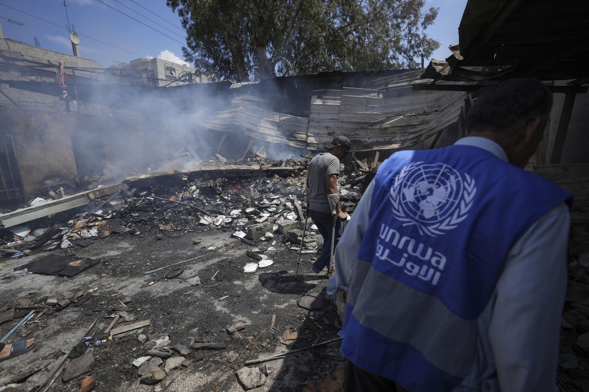 Palestinians look at the destruction after an Israeli strike on a school run by UNRWA, the U.N. agency helping Palestinian refugees, in Nuseirat, Gaza Strip, May 14, 2024. Qatar and Saudi Arabia on Sunday, June 2, 2024 condemned an Israeli parliamentary bill that seeks to label UNRWA, the main provider of aid for Palestinians in Gaza, a terrorist group, joining a growing number of nations opposed to the proposal Palestinians look at the destruction after an Israeli strike on a school run by UNRWA, the U.N. agency helping Palestinian refugees, in Nuseirat, Gaza Strip, May 14, 2024. Qatar and Saudi Arabia on Sunday, June 2, 2024 condemned an Israeli parliamentary bill that seeks to label UNRWA, the main provider of aid for Palestinians in Gaza, a terrorist group, joining a growing number of nations opposed to the proposal - Sputnik International, 1920, 30.07.2025