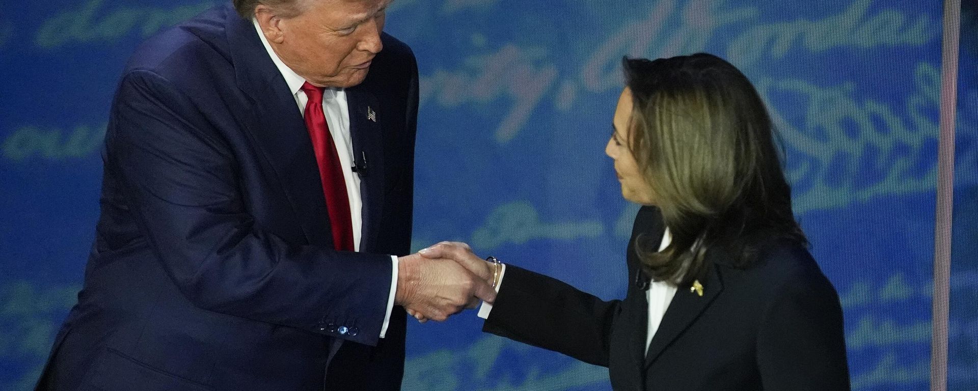 Republican presidential nominee former President Donald Trump and Democratic presidential nominee Vice President Kamala Harris shake hands before the start of an ABC News presidential debate at the National Constitution Center, Tuesday, Sept. 10, 2024, in Philadelphia. Republican presidential nominee former President Donald Trump and Democratic presidential nominee Vice President Kamala Harris shake hands before the start of an ABC News presidential debate at the National Constitution Center, Tuesday, Sept. 10, 2024, in Philadelphia. - Sputnik International, 1920, 20.10.2024