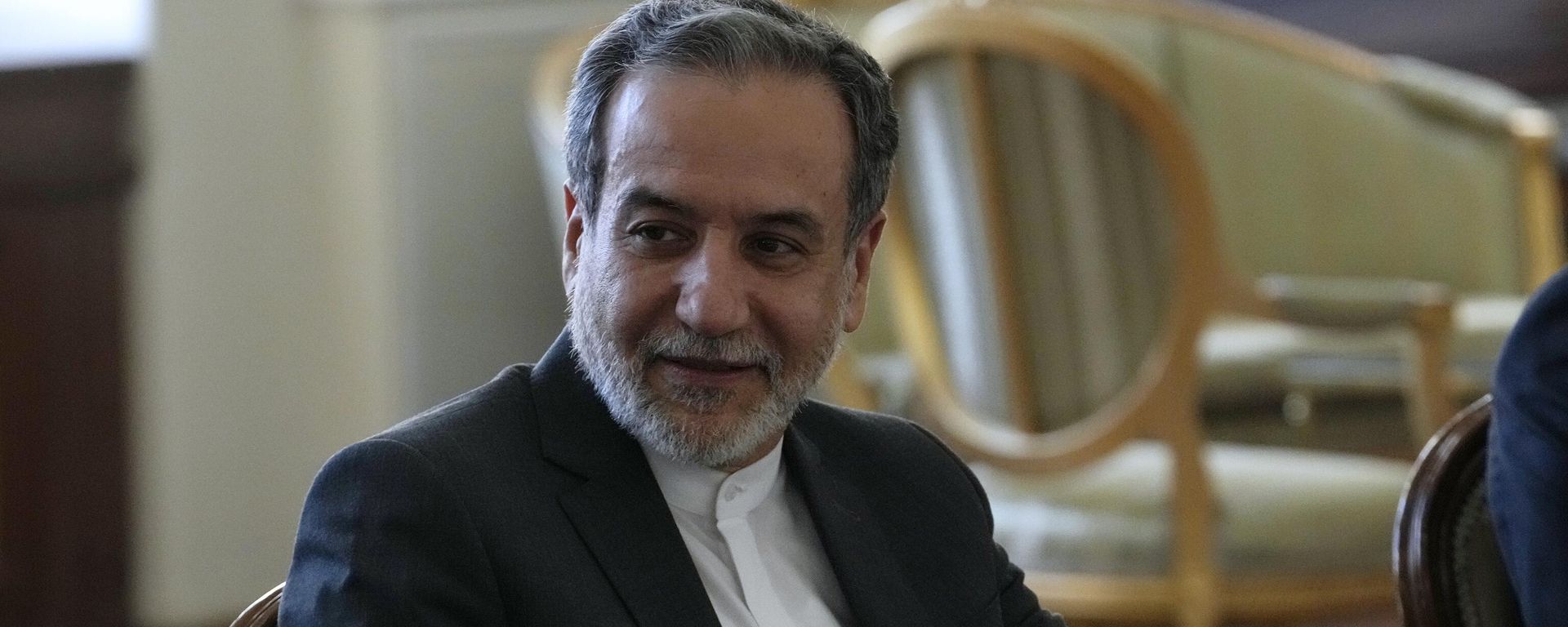 Iranian Foreign Minister Abbas Araghchi attends a meeting with Qatari Prime Minister and Foreign Minister Sheikh Mohammed bin Abdulrahman Al Thani in Tehran, Iran, Monday, Aug. 26, 2024. (AP Photo/Vahid Salemi) - Sputnik International, 1920, 18.05.2025