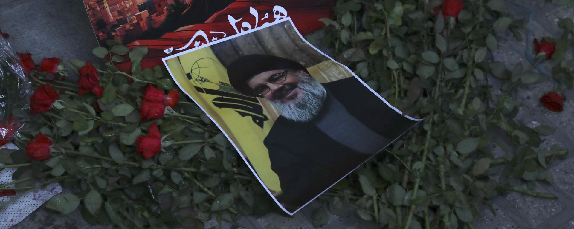A poster of Hezbollah leader Sayyed Hassan Nasrallah is placed on flowers in front of the Lebanese Embassy in Tehran, Iran, Wednesday, Sept. 18, 2024. A poster of Hezbollah leader Sayyed Hassan Nasrallah is placed on flowers in front of the Lebanese Embassy in Tehran, Iran, Wednesday, Sept. 18, 2024. - Sputnik International, 1920, 28.09.2024