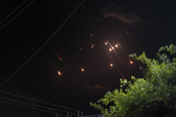 Missiles launched from Iran towards Israel streak across the night sky as seen from the Gaza Strip.  - Sputnik International