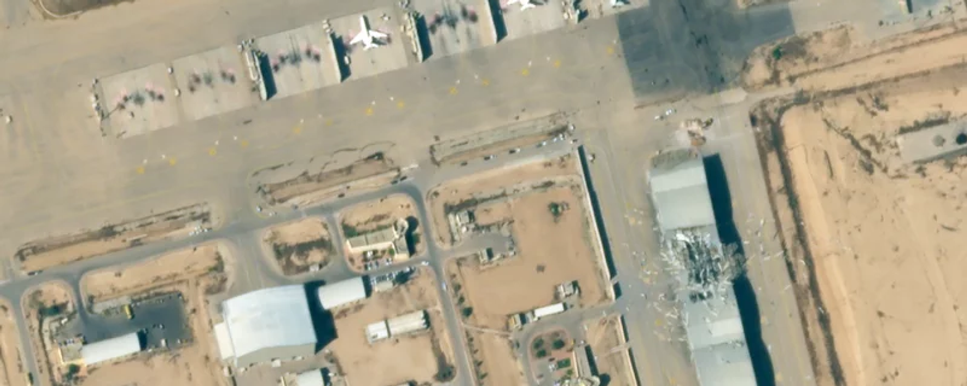 An image of Nevatim Airbase taken on Oct. 2 shows damage to a hangar and a taxiway caused by Iranian missile strikes. An image of Nevatim Airbase taken on Oct. 2 shows damage to a hangar and a taxiway caused by Iranian missile strikes. - Sputnik International, 1920, 05.10.2024