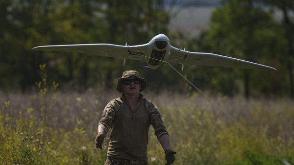 A Ukrainian serviceman of the Ochi reconnaissance unit launches a Furia drone to fly over Russian positions at the frontline in Donetsk region, Ukraine, on Sunday, June 30, 2024.  - Sputnik International