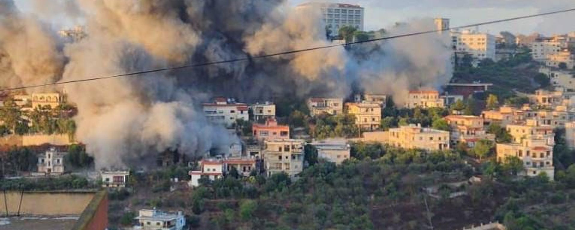 The Lebanese town of Aynata hit by an Israeli airstrike. File photo The Lebanese town of Aynata hit by an Israeli airstrike. File photo - Sputnik International, 1920, 21.10.2024