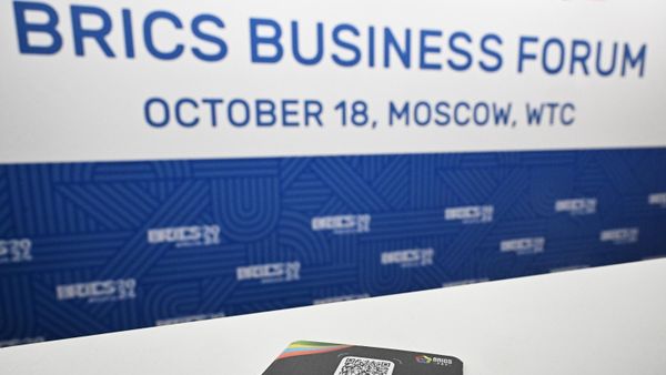 BRICS Pay promo card on display at the BRICS Business Forum in Moscow. October 18, 2024 - Sputnik International