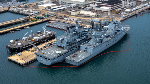 An aerial view of German Navy frigate FGS Baden-Wurttemberg (F 222), right, and German Navy Berlin-class replenishment ship FGS Frankfurt Am Main (A 1412), moored at Joint Base Pearl Harbor-Hickam, Hawaii, during Exercise Rim of the Pacific (RIMPAC), July 2024. - Sputnik International