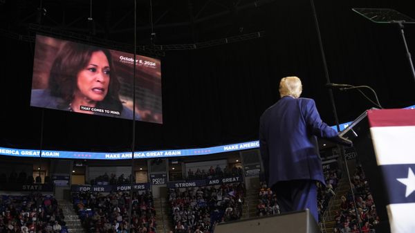 Republican presidential nominee former President Donald Trump watches a video of Democratic presidential nominee Vice President Kamala Harris as he speaks at a campaign rally at the Bryce Jordan Center, Saturday, Oct. 26, 2024, in State College, Pa. Republican presidential nominee former President Donald Trump watches a video of Democratic presidential nominee Vice President Kamala Harris as he speaks at a campaign rally at the Bryce Jordan Center, Saturday, Oct. 26, 2024, in State College, Pa. - Sputnik International