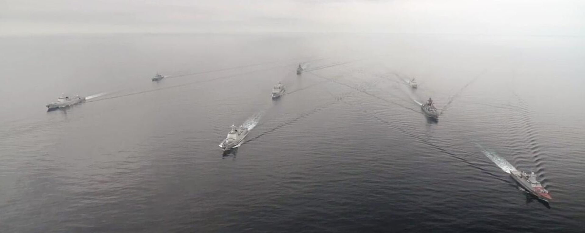 In this handout video grab released by the Russian Defence Ministry, Russian and Chinese Navy ships sail during Russia-China joint naval exercises in the Sea of Japan, China - Sputnik International, 1920, 03.08.2025