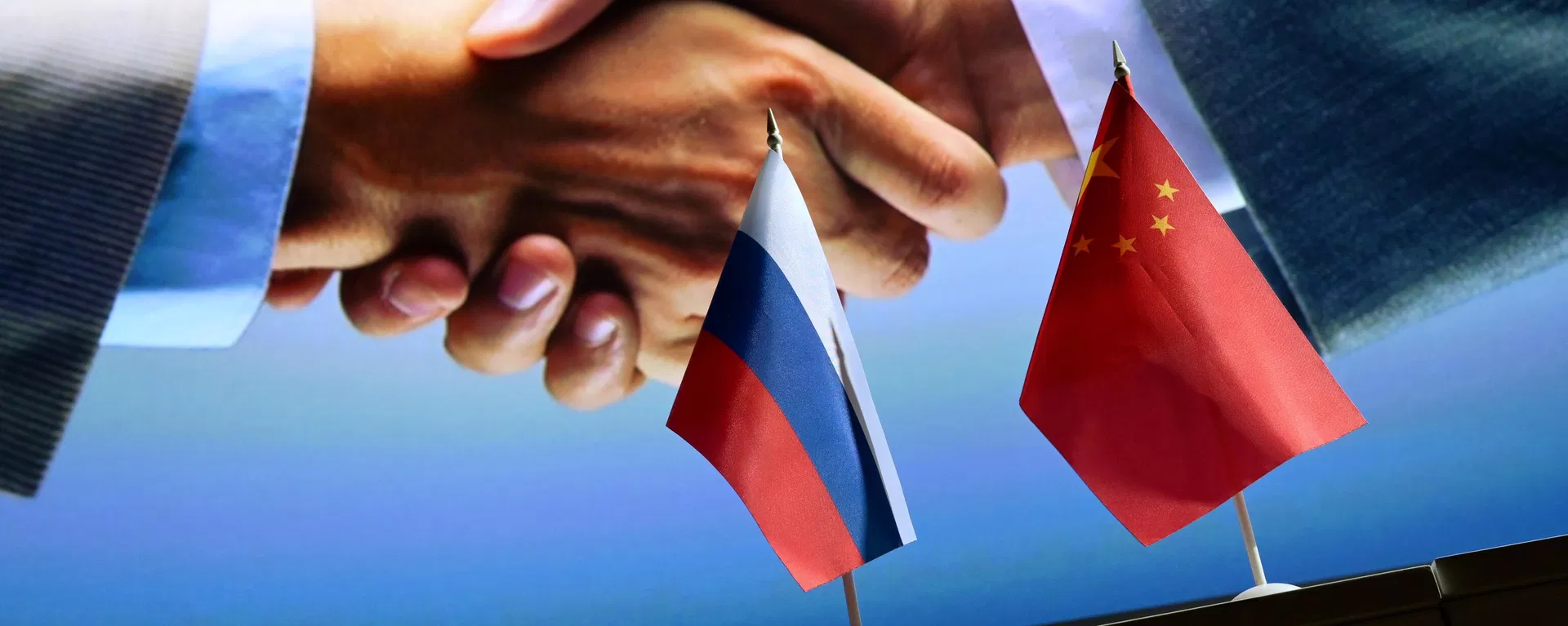  Russian and Chinese flags.File photo - Sputnik International, 1920, 12.10.2026