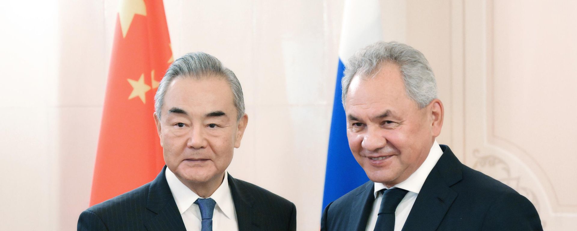 Russian Security Council Secretary Sergei Shoigu and Chinese Foreign Minister Wang Yi. File photo - Sputnik International, 1920, 01.02.2026