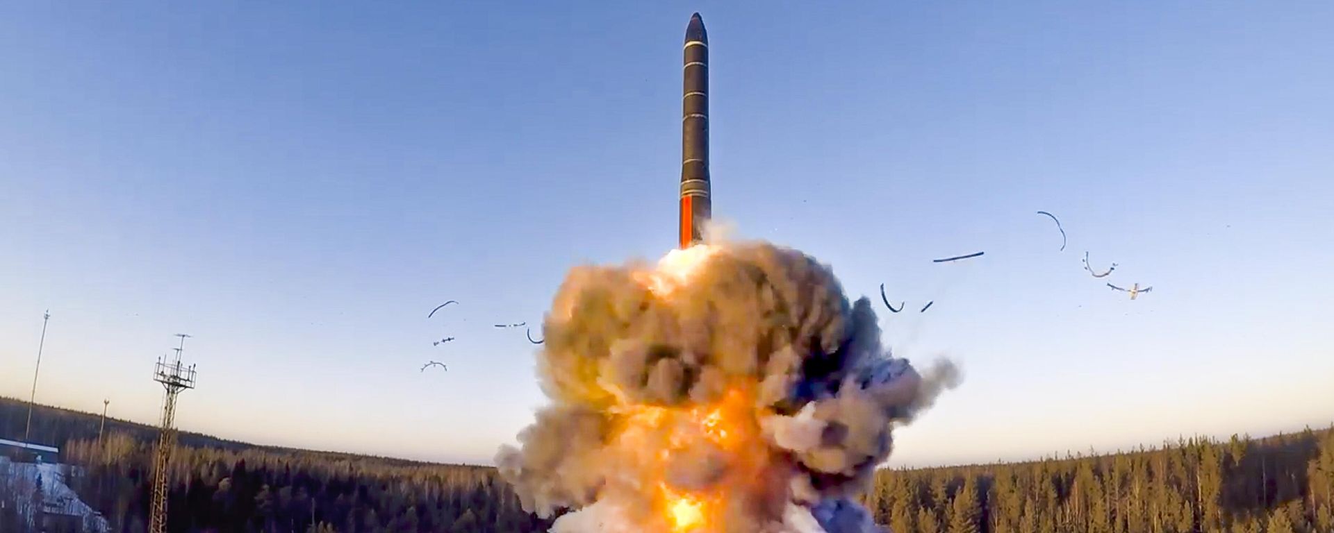 In this file photo taken from a video distributed by Russian Defense Ministry Press Service, on Wednesday, Dec. 9, 2020, a rocket launches from missile system as part of a ground-based intercontinental ballistic missile test launched from the Plesetsk facility in northwestern Russia - Sputnik International, 1920, 26.07.2025