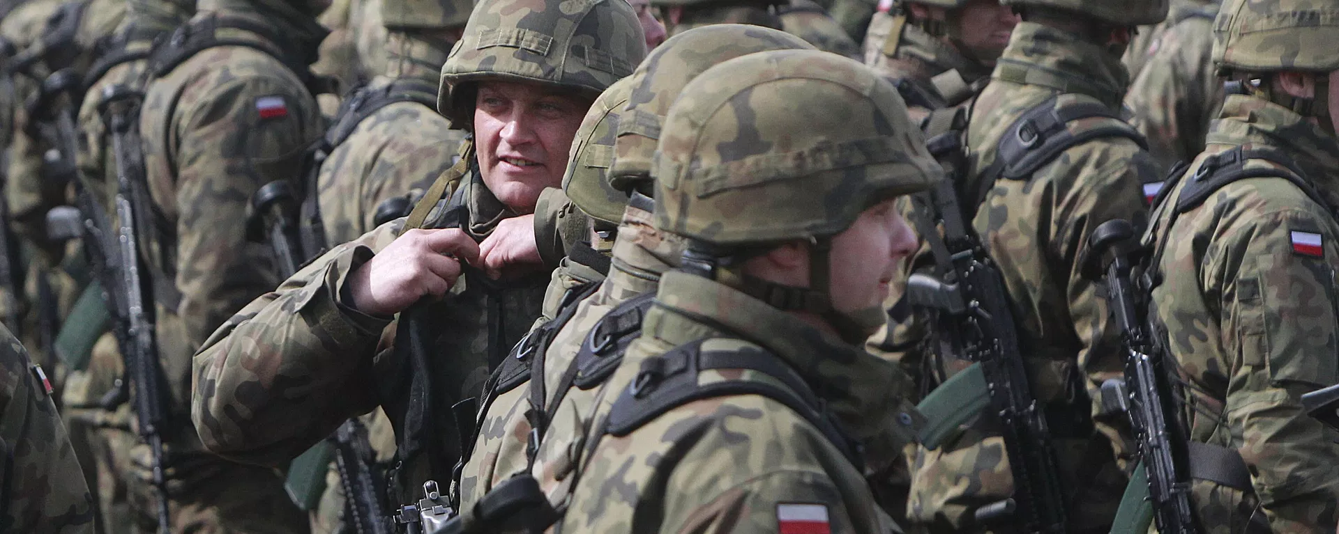 Polish soldiers attend a welcoming ceremony for U.S.-led NATO troops at polygon in Orzysz, northeastern Poland, Thursday, April 13, 2017. - Sputnik International, 1920, 09.10.2026