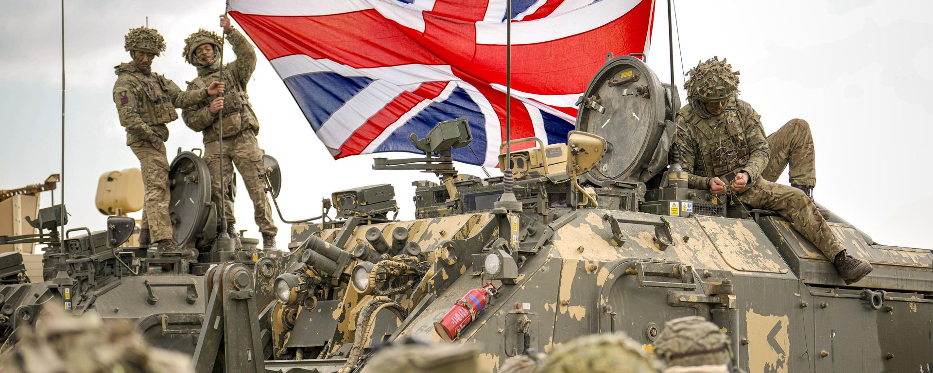 British servicemen unfurl the Union Jack flag before the start of the Steadfast Dart 2025 exercise, involving some 10,000 troops in three different countries from nine nations and represent the largest NATO operation planned this year, at a training range in Smardan, eastern Romania, Wednesday, Feb. 19, 2025. British servicemen unfurl the Union Jack flag before the start of the Steadfast Dart 2025 exercise, involving some 10,000 troops in three different countries from nine nations and represent the largest NATO operation planned this year, at a training range in Smardan, eastern Romania, Wednesday, Feb. 19, 2025. - Sputnik International, 1920, 17.03.2025